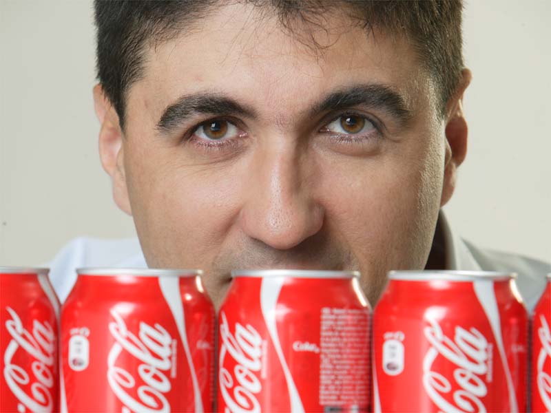 Cine a restructurat Coca-Cola in Romania