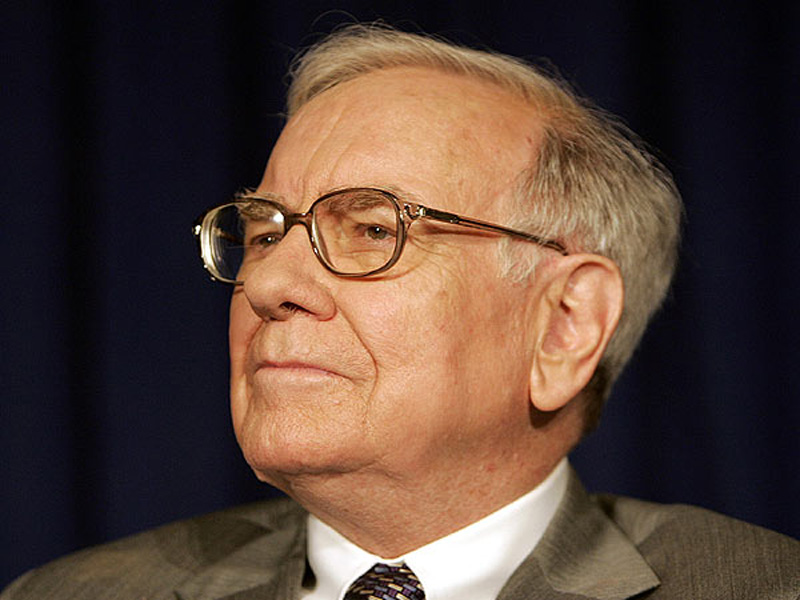 Warren Buffett continua sa vanda din participatia detinuta la Moody's