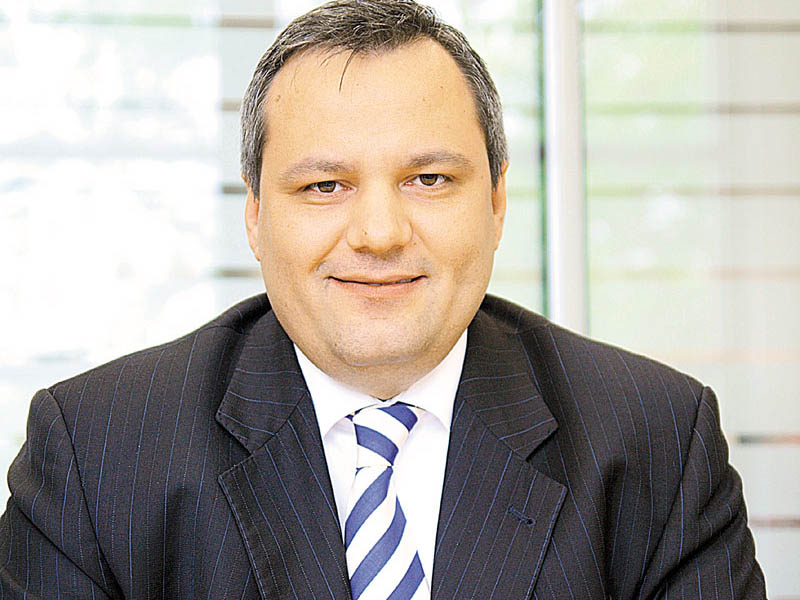 Un roman preia conducerea GE Money