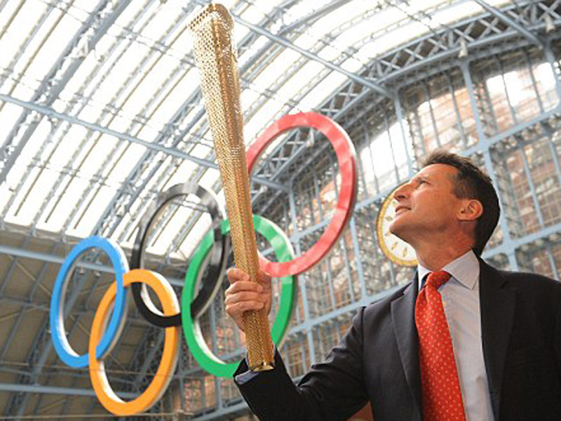 8.000 de alergatori vor purta torta olimpica editia 2012