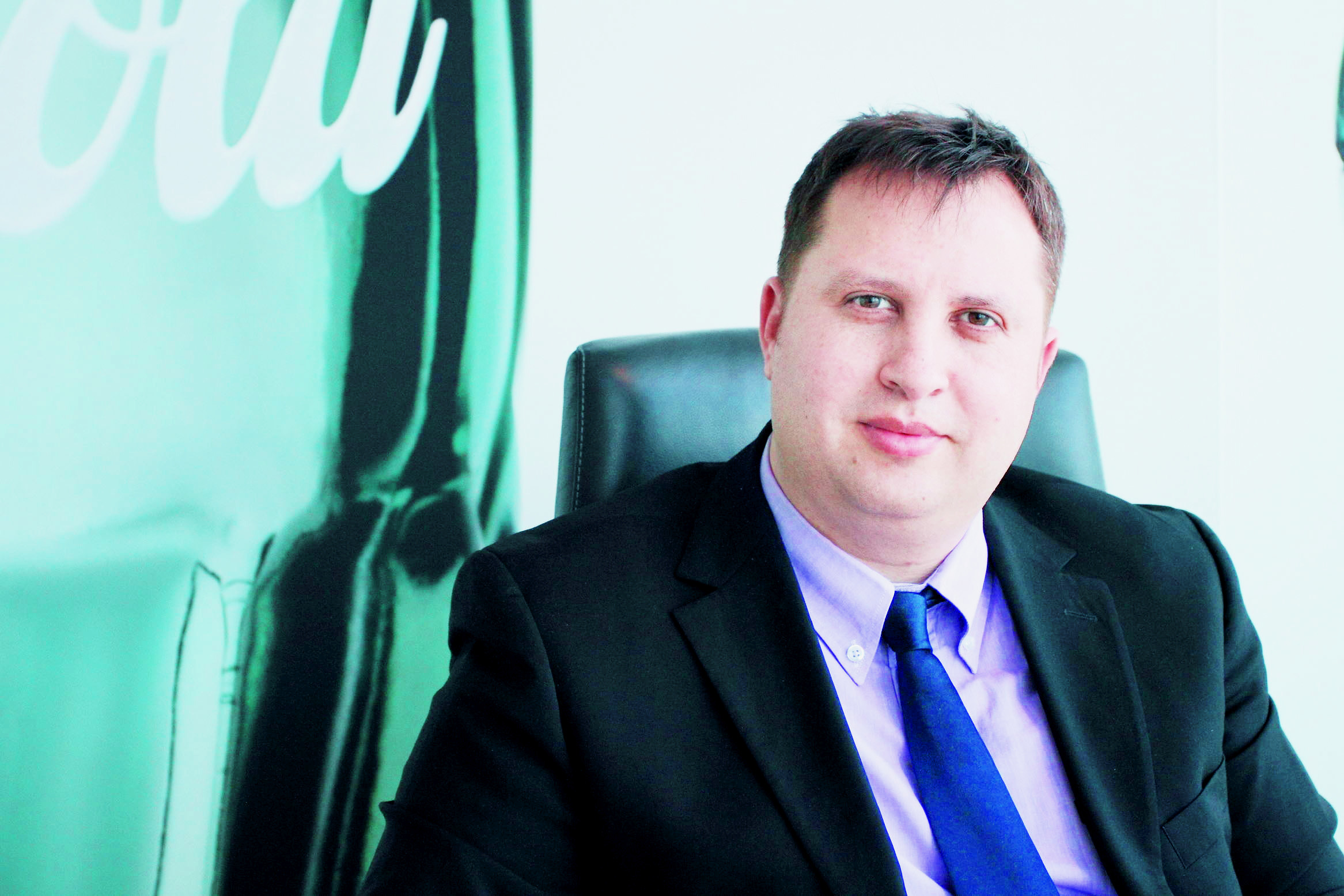 TINERI MANAGERI DE TOP: Lucian Marin conduce 800 de angajati ai Coca-Cola HBC