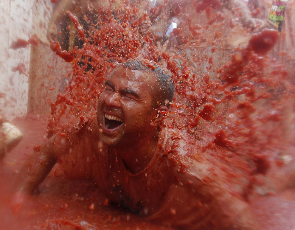Festival murdar: Bătaie cu roșii în fiecare an în Spania - GALERIE FOTO