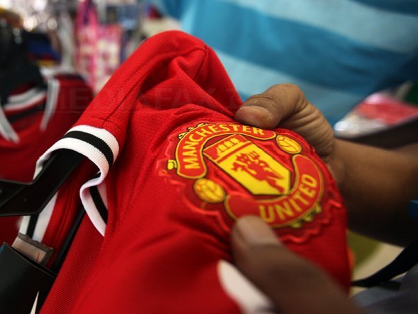 Listarea Manchester United la Singapore, criticată din cauză că dezavantajează acționarii minoritari