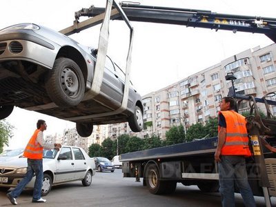 Mașinile ar putea fi ridicate numai ca măsură excepțională. Sumele încasate devin venituri la bugetele locale