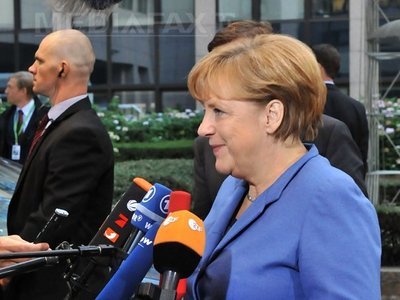 Merkel: Soluția la criza datoriilor este creșterea atribuțiilor instituțiilor europene