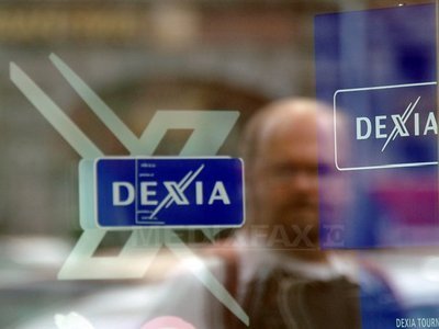 Moody’s ar putea retrograda Belgia din cauza costurilor susținerii grupului bancar Dexia