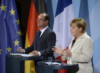 Angela Merkel și Francois Hollande își doresc păstrarea Greciei în zona euro