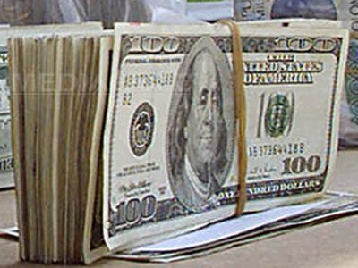 Dolarul se depreciază după realegerea lui Obama ca președinte al SUA