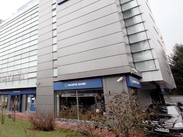 Cât costă retragerile de bani de la Marfin Bank