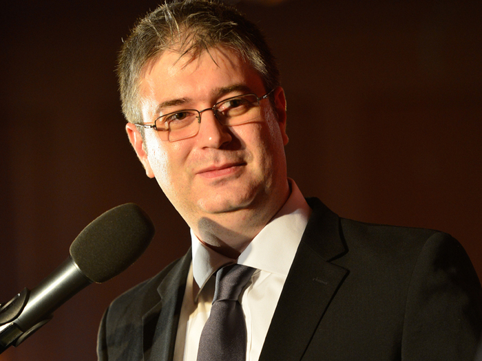 Câți bani face cel mai bun programator român din lume