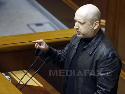 Turcinov promite o amnistiere separatiștilor proruși din estul Ucrainei care depun armele
