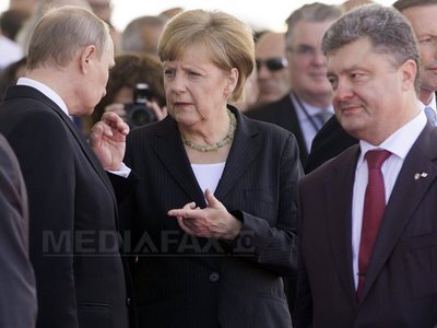 Vladimir Putin A DISCUTAT cu Petro Poroșenko despre detensionarea crizei ucrainene. Președintele ucrainean a prezentat un plan de pace, dar s-a plâns de o presupusă incursiune a unor tancuri