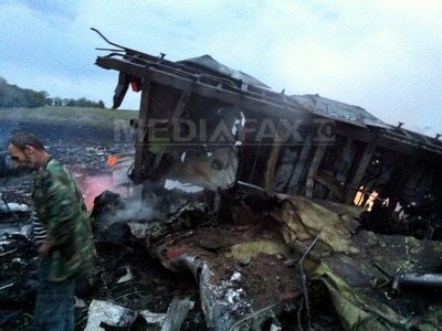 Tragedia din Ucraina: Rebelii proruși cer un ARMISTIȚIU în schimbul garantării securității la locul prăbușirii avionului
