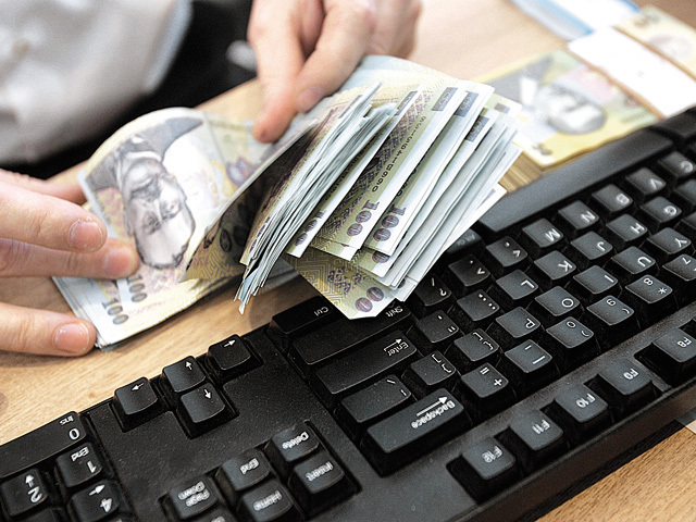 Dobânda Robor scade la un nivel minim istoric. Românii ar putea plăti rate mai mici la credite chiar din martie