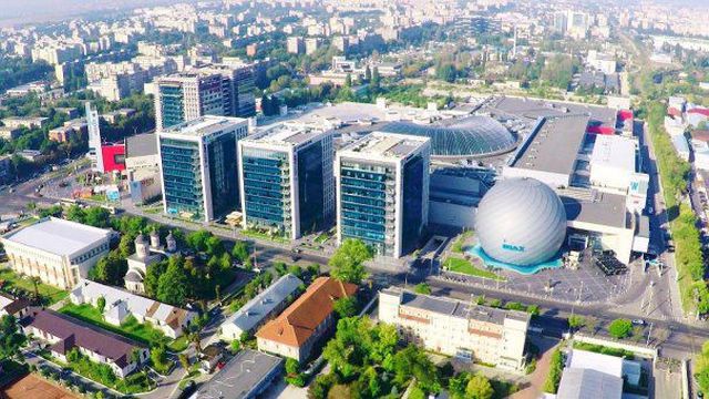 Tranzacție surpriză de aproape 100 mil. euro: AFI a semnat un acord pentru vânzarea a trei din cele cinci clădiri de birouri de langă mallul AFI Cotroceni