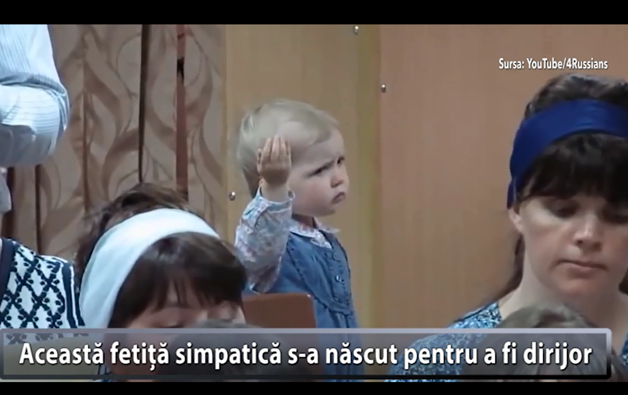 ADORABIL. Cum dirijează această fetiță talentată un cor bisericesc