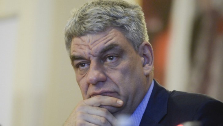 Un bancher vrea să-l convingă pe premierul Tudose să-și facă card