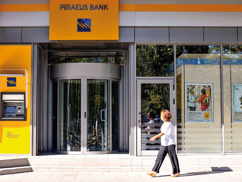Grecii de la Piraeus au vândut subsidiara din România către fondul de investiții J.C Flowers după mai bine de un an de discuții