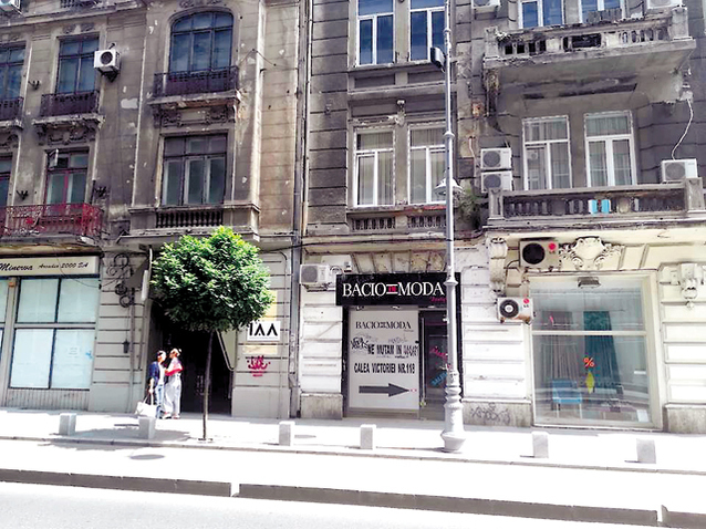 Calea Victoriei „se zbate“ între branduri de lux precum Gucci sau Hugo Boss și magazine în ruină