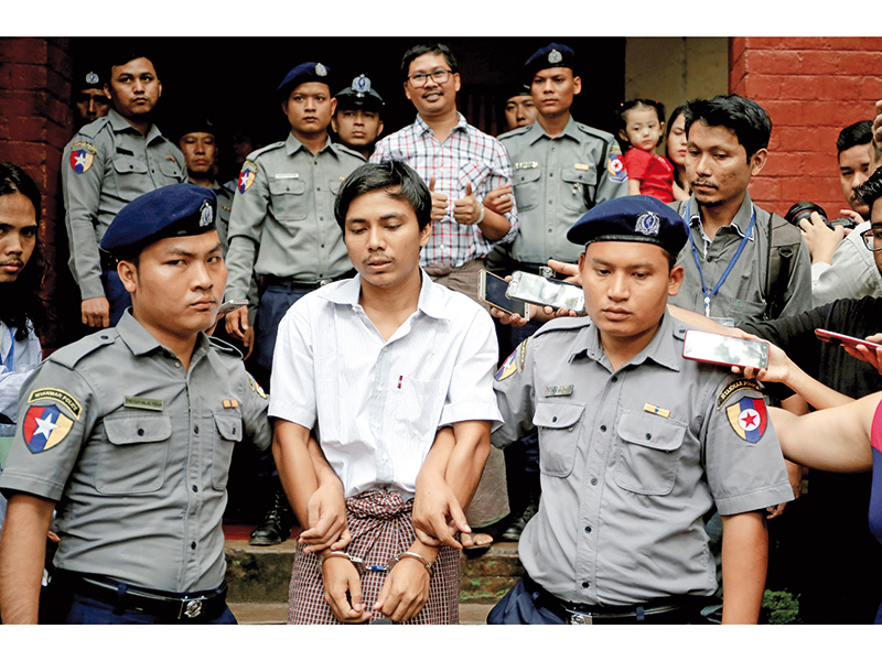Jurnaliști de la Reuters, încarcerați în Myanmar