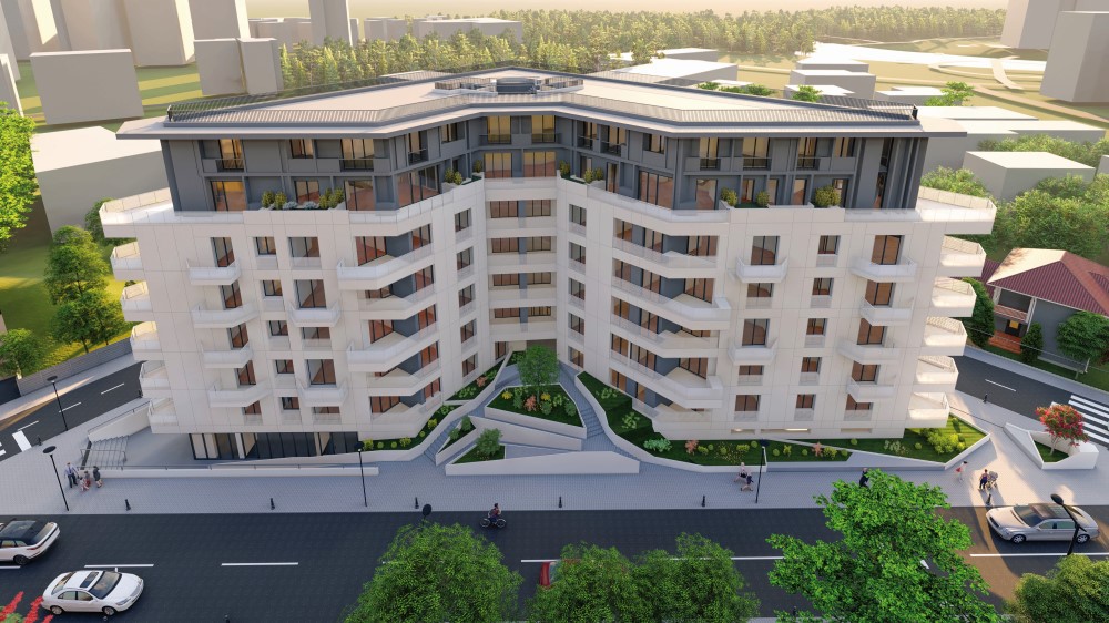 Tranzacție în plină criză: Bogdan Dragomir, fiul lui Dumitru Dragomir, a cumpărat un bloc de locuințe cu 2 mil. euro de la producătorul de băuturi Alexandrion