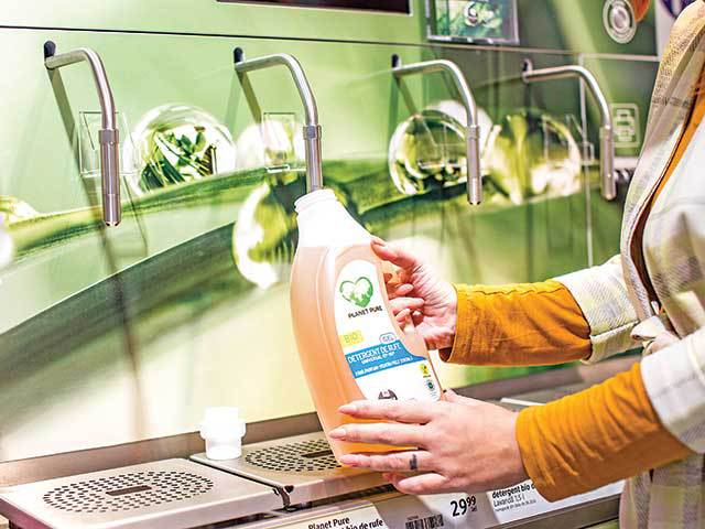 dm drogerie markt SRL | Stații de reumplere pentru detergenți de rufe și vase bio Planet Pure