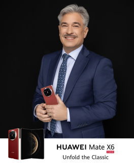 A person in a suit holding a phoneAI-generated content may be incorrect.