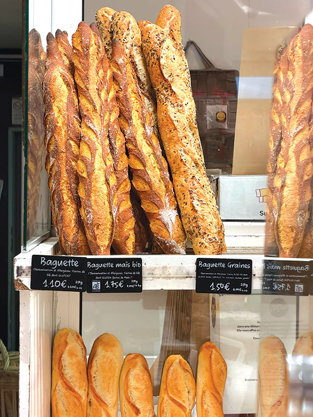Cum se explică faptul că un croissant cu unt sau o baghetă costă de două ori mai puțin la Paris decât la București, deși salariile sunt duble în Capitala Franței versus local?